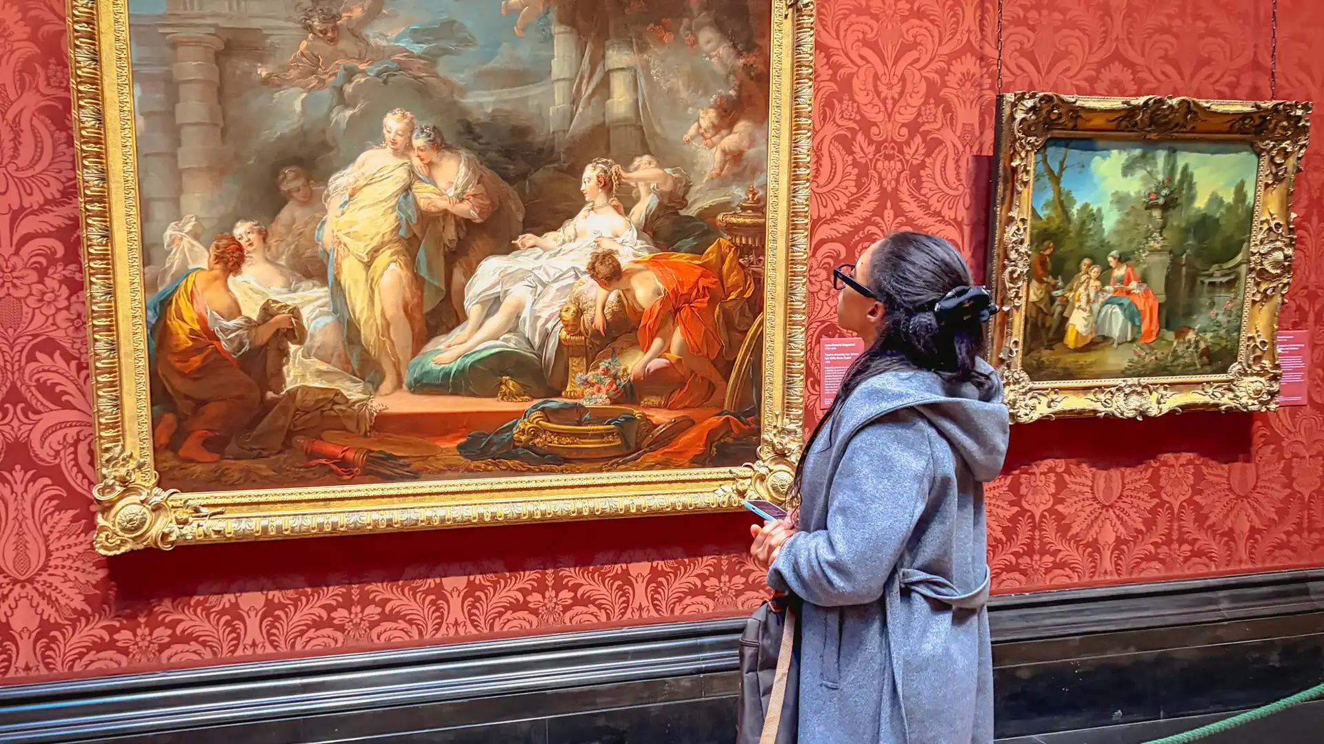 A visitor using The Voice of the Gallery at the National Gallery